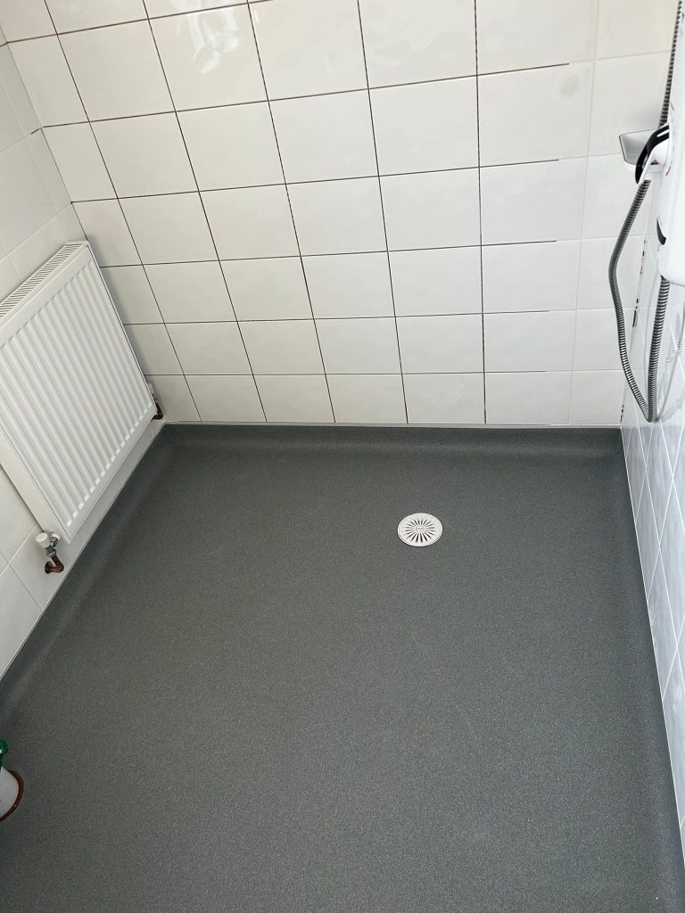 326990210_880450313273285_3061428367627471379_n wet room flooring and drainage for shower areas