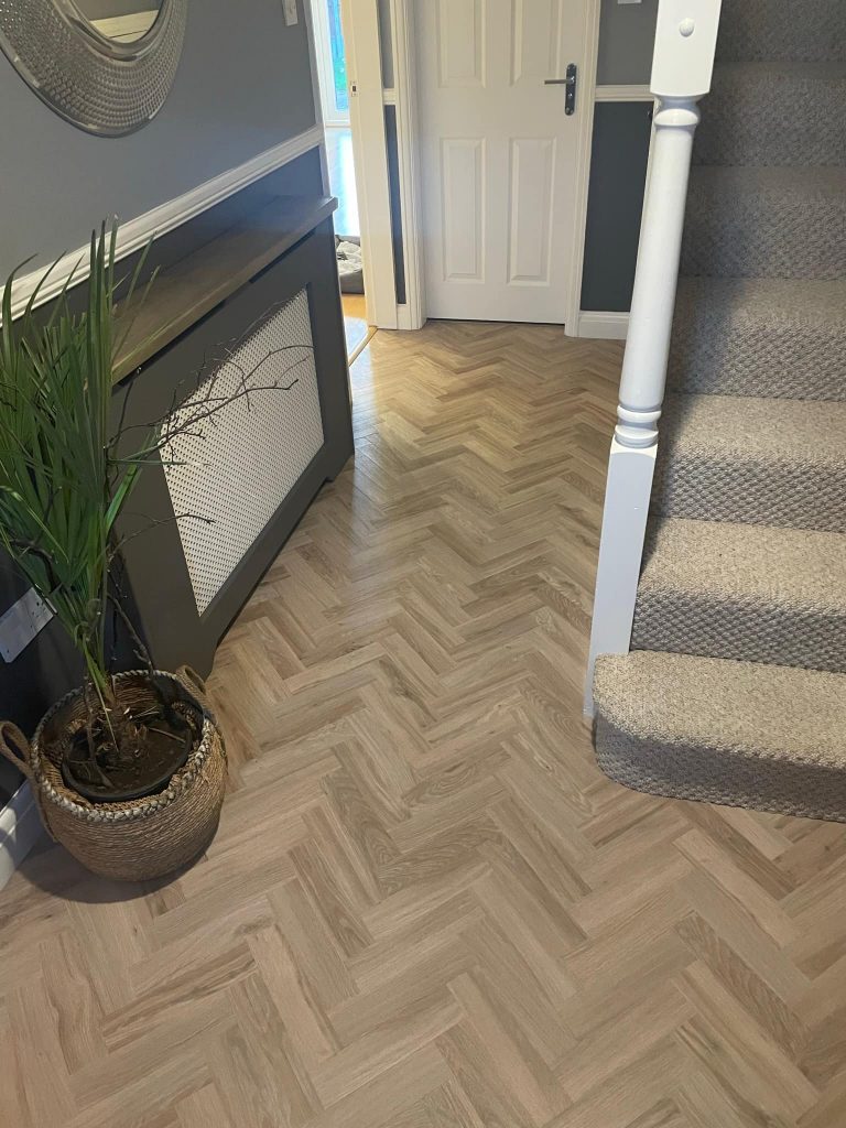 328500048_1549609298869916_3711865490488697389_n vinyl flooring giving the effect of parquet flooring